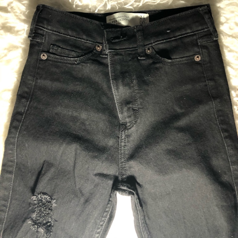 Black ripped jeans, worn once, just for $18!